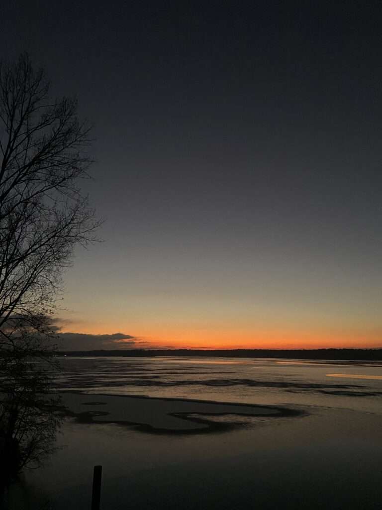 Sonnenuntergang über der Havel mit Eis